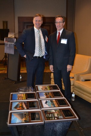 Healthcare Real Estate Insights™ Editor John B. Mugford (left) and Publisher Murray W. Wolf posed with the 2015 HREI Insights Awards™ before the Dec. 3, 2015, presentation in Scottsdale, Ariz. HREI™ photo