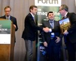 John B. Mugford, editor of Healthcare Real Estate Insights (far left), announces the 2018 HREI Insights Award for Best MOB of less than 25,000 square feet, which went to MedProperties Group. Accepting the award for MedProperties Group from HREI Publisher Murray W. Wolf (far right) during the awards presentation Dec. 6 were Dan Ahlering and Vlad Milrud.