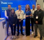 Photo caption (L to R): Diego Galvez, ABS Consulting Business Development Representative; Mariana Arango, ABS Consulting Marketing Specialist; Luiz Mello, University of Michigan Health Facilities Applications Manager; Dottie Griggers, ABS Consulting Business Development Manager; Jason Smith, ABS Consulting Business Development Director; and John Craig, ABS Consulting Business Development Manager.